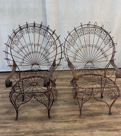 Antique iron peacock chairs