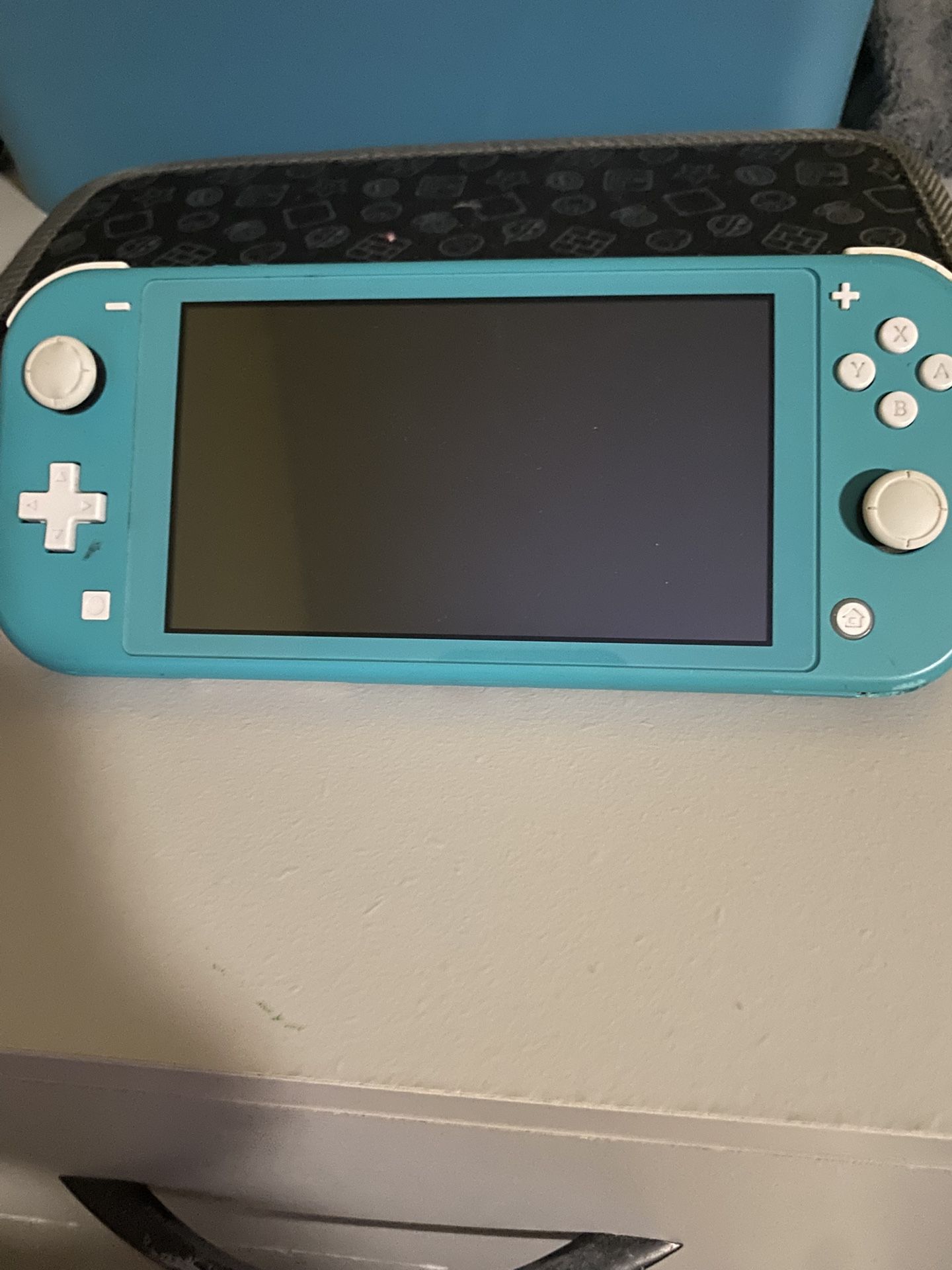 Blue Nintendo Switch Lite With Charger,games Included,and Game Case