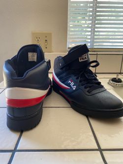Fila tennis shoes size 11 blue ,red ,white