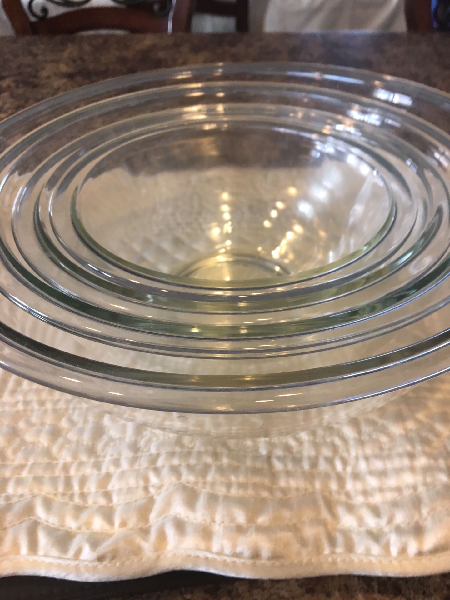 Four stacking Pyrex mixing bowls