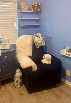 Dark blue rocking swivel recliner