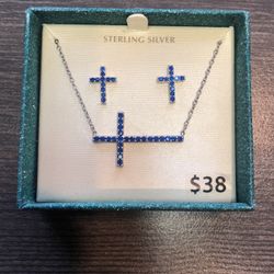 Beautiful Sterling Silver Cross necklace and earring set. Never worn in original display box.
