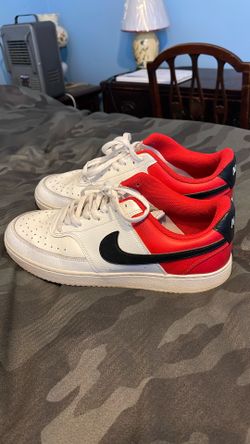 white and red Nike Air Force 1 low