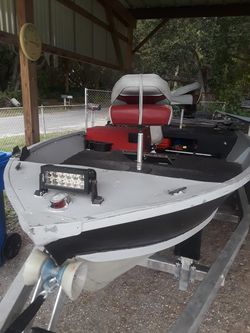 15 ft Vhull bass boat and like new trailer