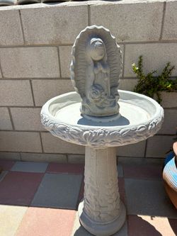 New birdbath made out of cement