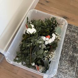 Large tub of greenery and some white florals