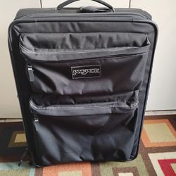 Very Nice Clean Black Jansport Suitcase On Wheels, Located In Reedley 