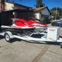Zieman 2006 PWC twin-trailer.  And 2005 Seadoo 3D, 2-stroke. 