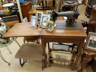 Vintage Kenmore sewing machine with wood cabinet