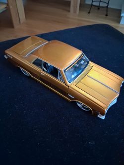 Metalic Gold 1965 Chevy Malibu SS Die Cast Model Car