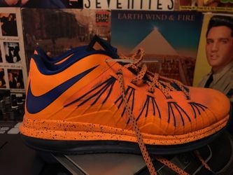 Orange Nike size 9 basketball shoes