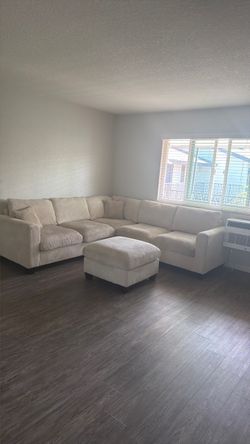 Beige Corduroy Sectional Sofa with Ottoman