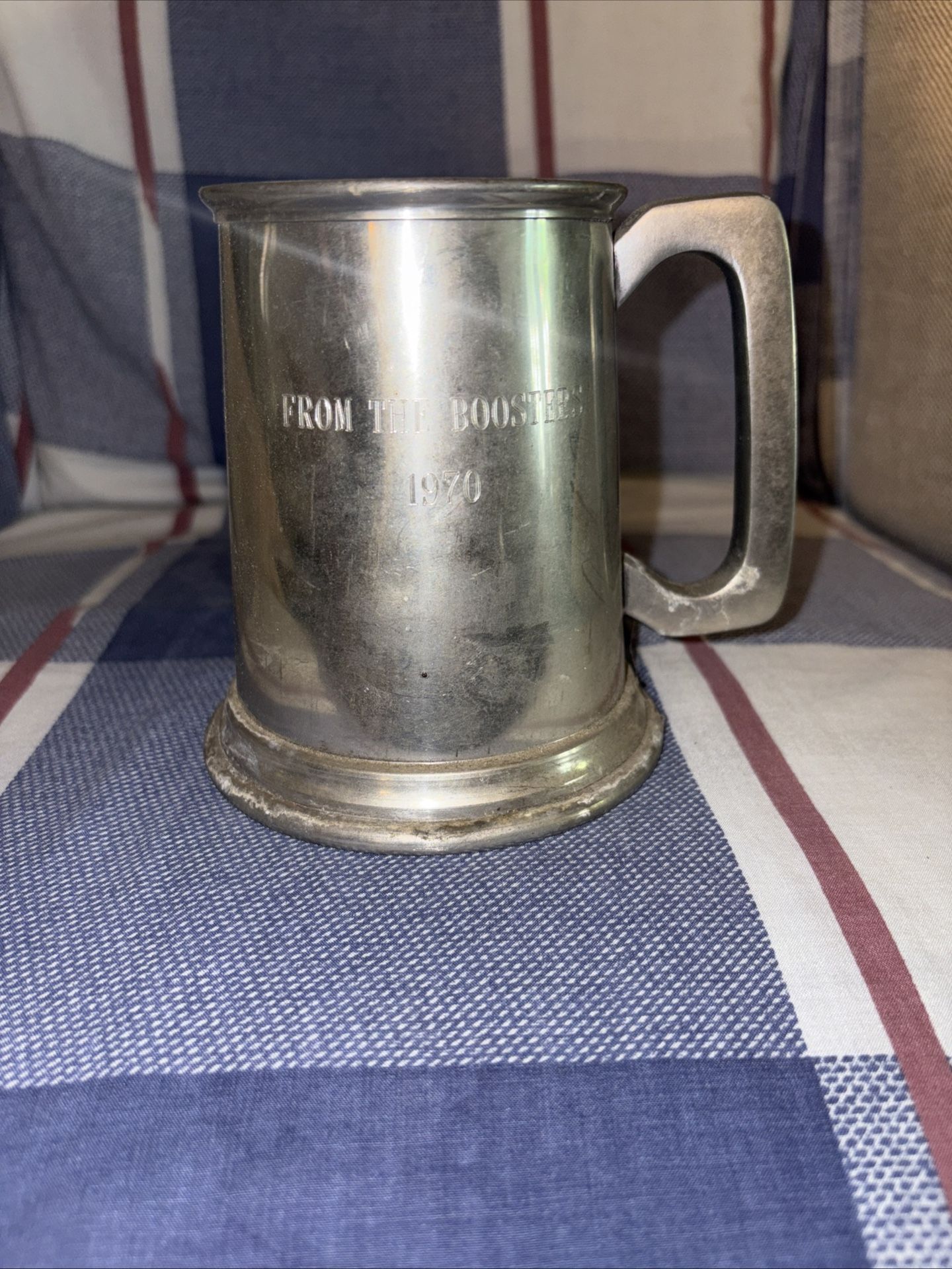 Orange, pewter mug marked England