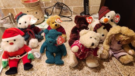 7 Ty beanie babies and one extra bear (costco)