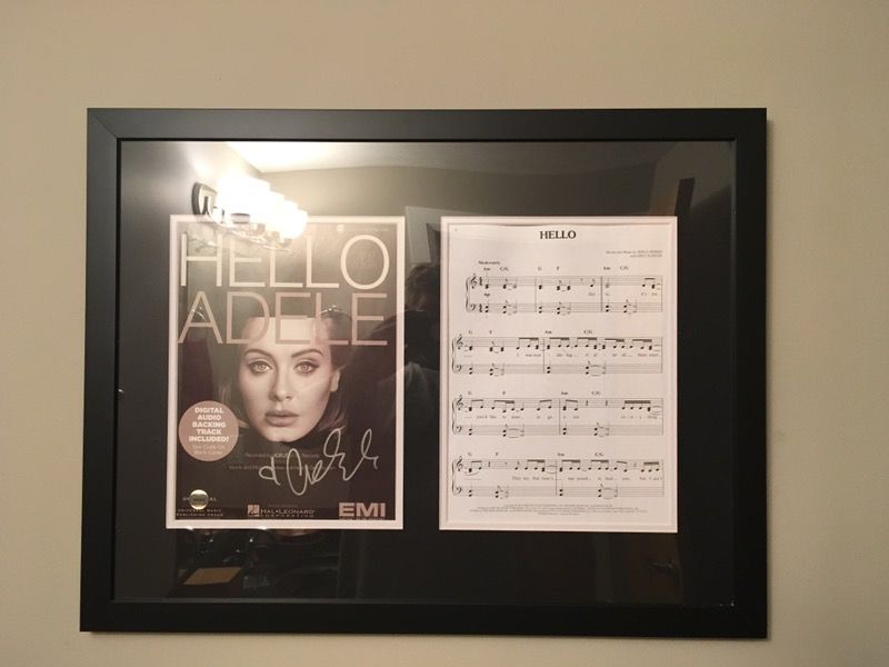 Signed album cover from "Hello" this is actually signed and authenticated by Adele.