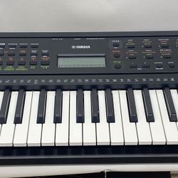 Yamaha PSR-E283 61-key Portable Keyboard With Power Adapter