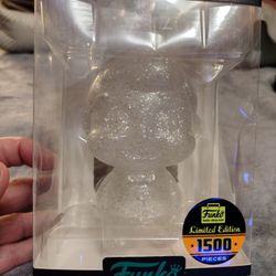 Freddy Funko Hikari vinyl figure, specifically the clear version with silver glitter. 