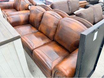 Brand new leather Italia sofa and loveseat.  70% off retail