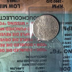 1902/S Morgan silver dollar