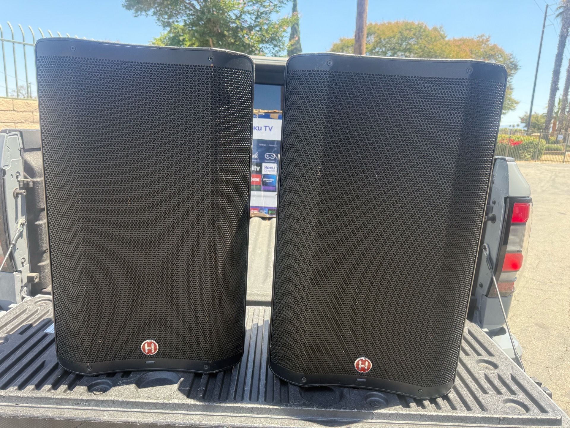 Harbinger speaker pair , with speakers stands and carrying case..