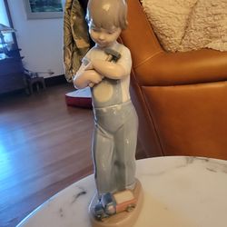 Lladro Boy With Toys