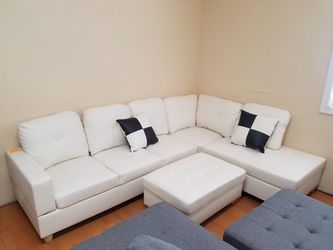 New in box white faux leathe sectional living room set special