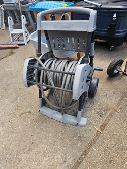 Price is firm.. large 200 suncast hose caddy with 100-ft hose