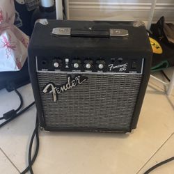 electric guitar and amp and adapter 