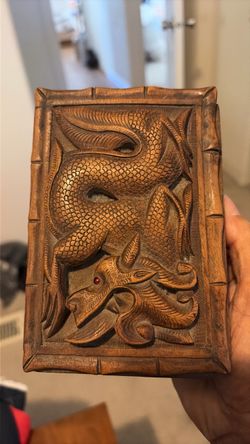 This is a hand carved trinket box mid 20 century carved out of walnut from India has seen in pictures
