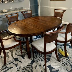Dining table with 6 chairs by henredon