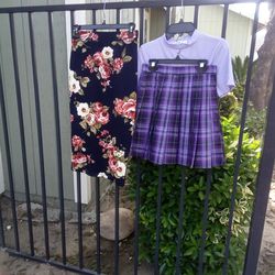 Rose skirt and purple and black and comes with a purple shirt