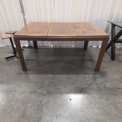 Light Brown Wood Extendable Dining Table with Leaves