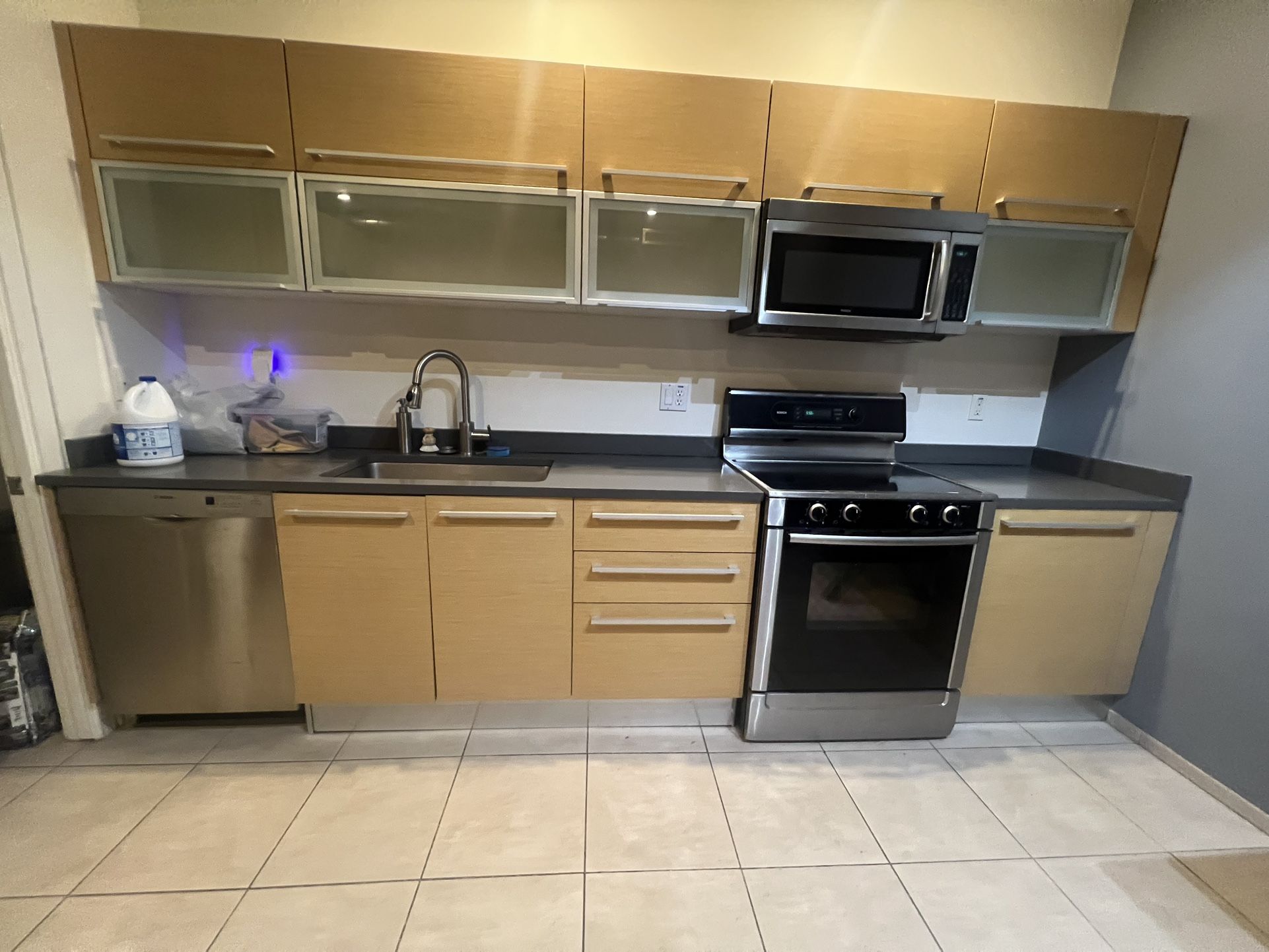 Used Cabinets and Caesarstone Countertops