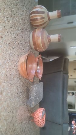 Potsfrom mexico...  salt and pepper shakers and measuring spoons