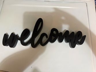 Black Cursive Welcome Word Sign