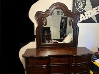 Traditional dark wood with mirror
