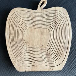 Collapsible Wooden Spiral Apple Fold up Basket   Good condition. No noticeable flaws that I see. Can be used flat as a tray/board or standing up as a 