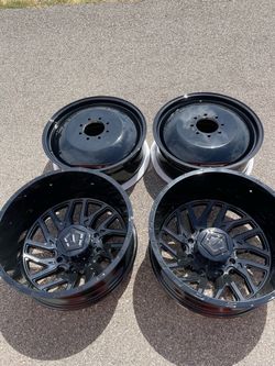 TIS 544B DUALLY WHEELS 8X210 - GLOSS BLACK ONLY BACK WHEELS  THROW ME AN OFFER