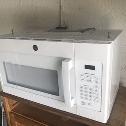 GE Microwave “Over The Range”, 1000 Watt. Like New Condition! Barely Touched. See Dimensions Below. 