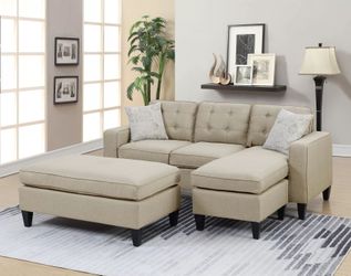 Brand new biege linen reversible sectional with ottoman (81"W x 60" D x 34" H) 