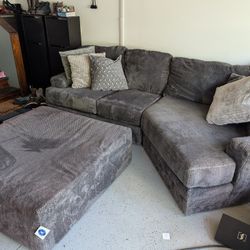 Gray Sectional Sofa with Oversized Cuddler And Ottoman – Rarely Use