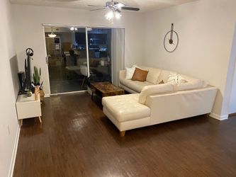White leather cough L shape
