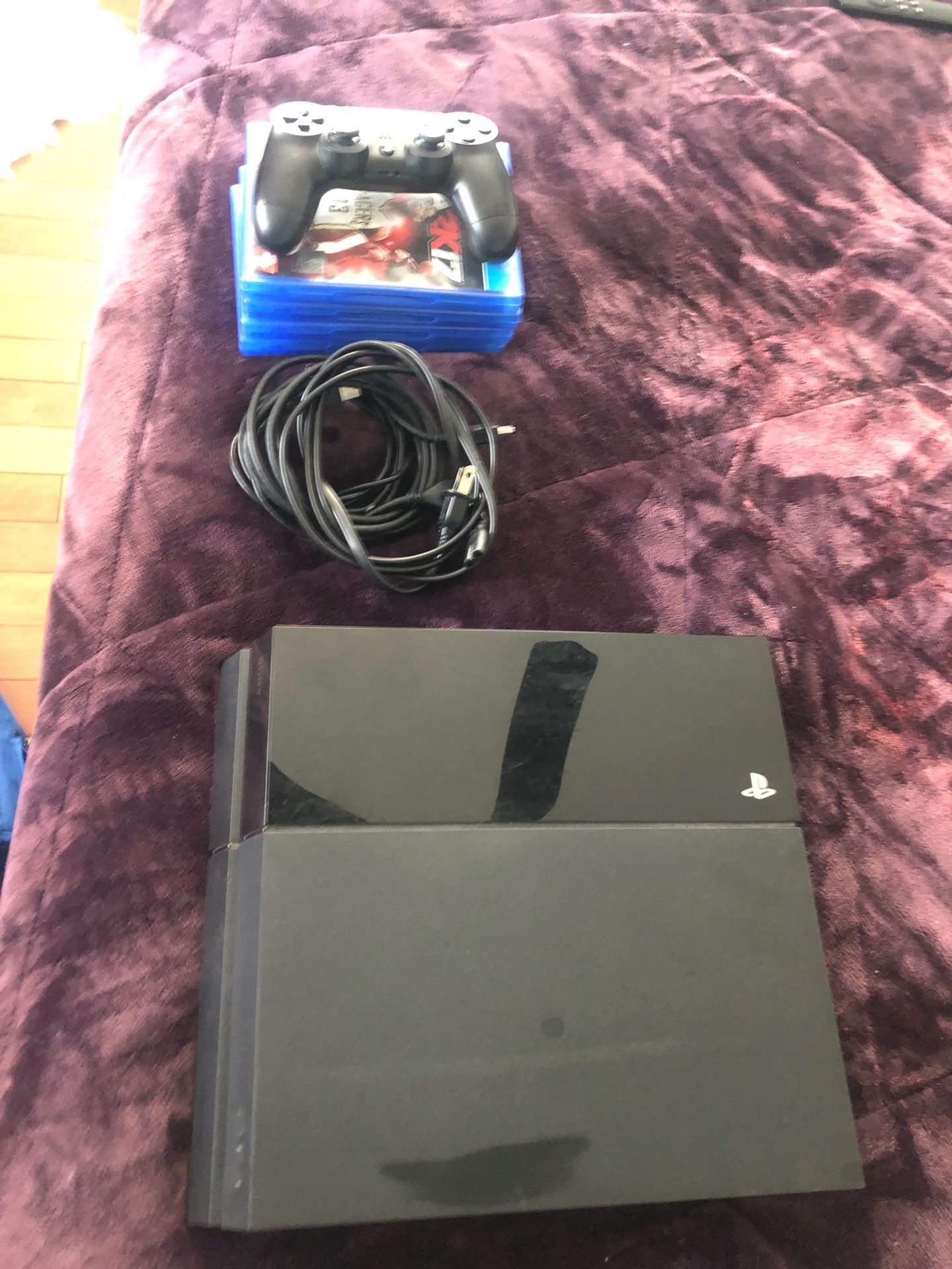 Used PS4 w/ controller, hdmi cord, controller charger, PS4 DC cord