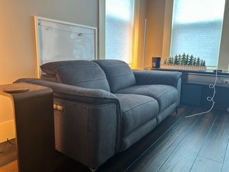 Modern Gray Power-Reclining Loveseat with Adjustable Headrests