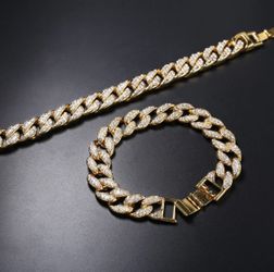 New 18 k yellow gold Cuban chain and bracelet set