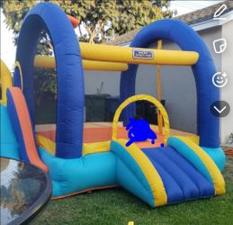 Small kids jumper w/basketball hoop and slide