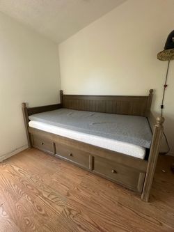 Twin trundle bed + 2 mattresses & mattress topper