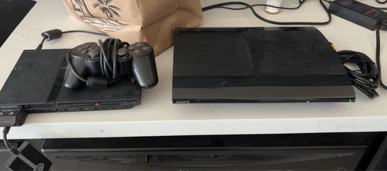 Playstation consoles and figurines