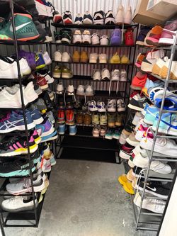 150 pairs of athletic and designer shoes all sizes!