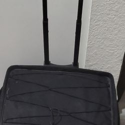 Like New Large Luggage/ Carry On / Briefcase On Wheels 